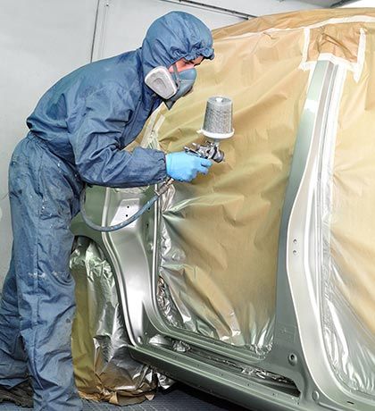 Auto Painting — Worker Painting the Car in Columbus, OH
