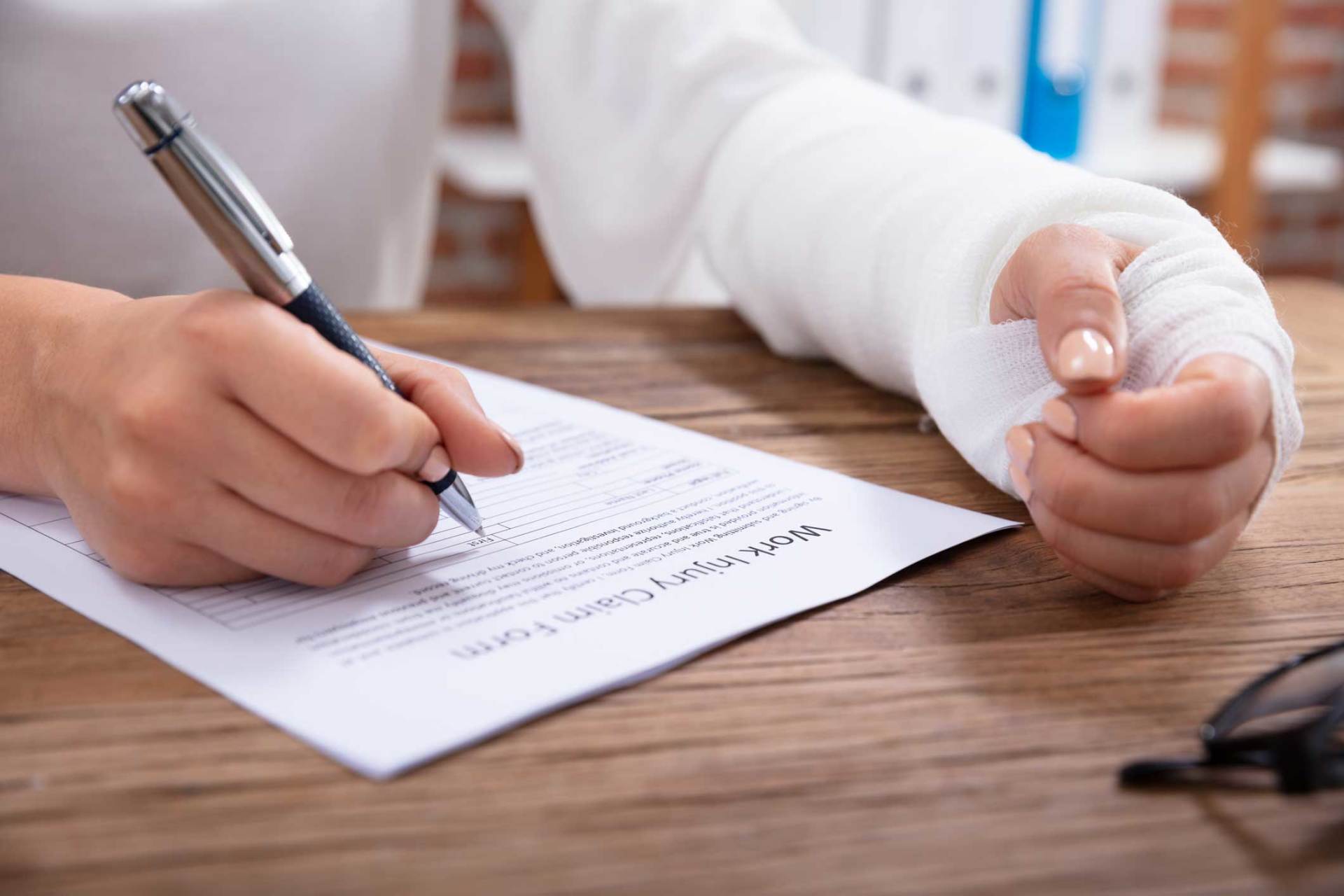 Injured Woman Hand With Bandage — Huntsville, AL — Elissa Green Attorney at Law