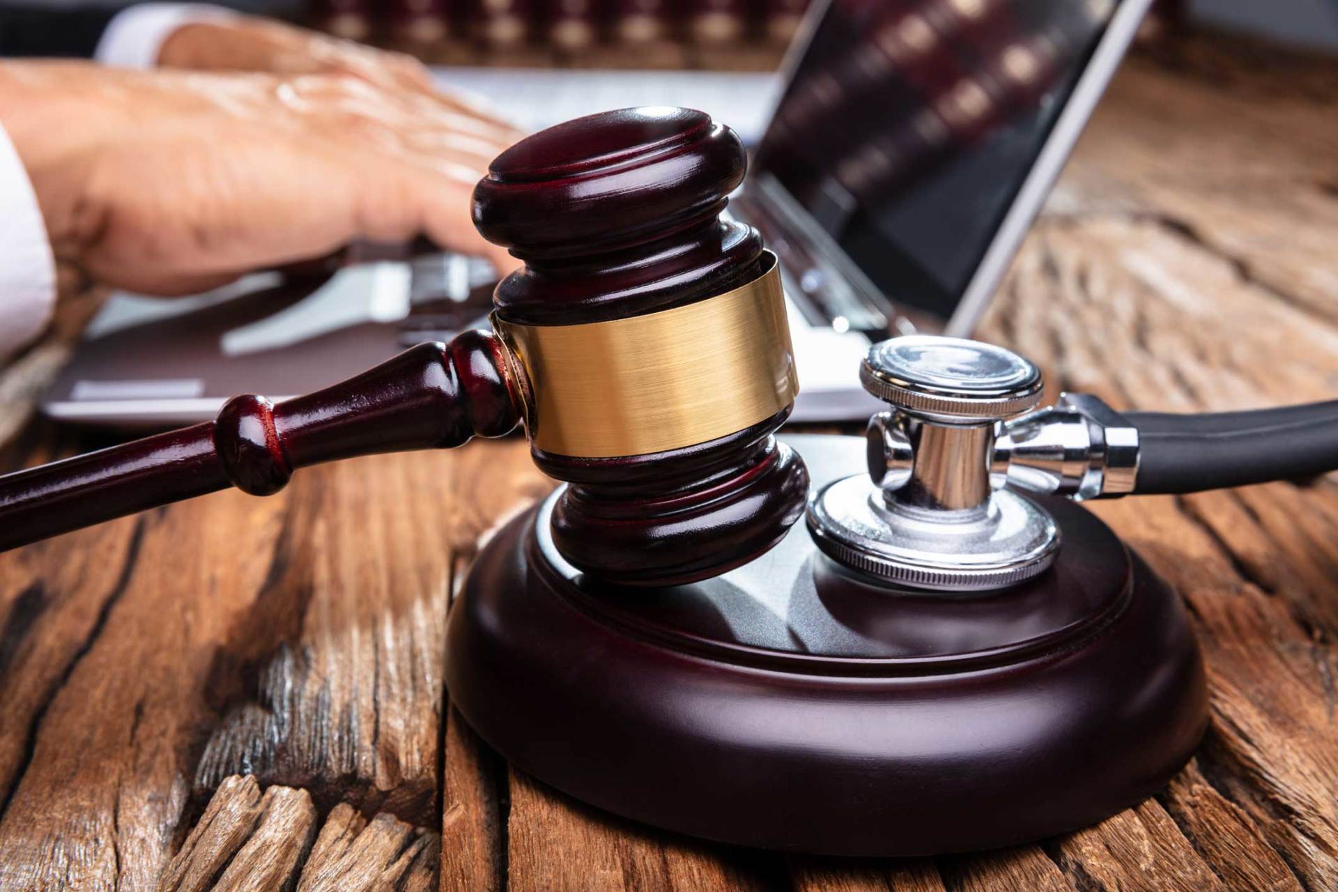 Mallet And Stethoscope On Gavel Over The Office Desk — Huntsville, AL — Elissa Green Attorney at Law