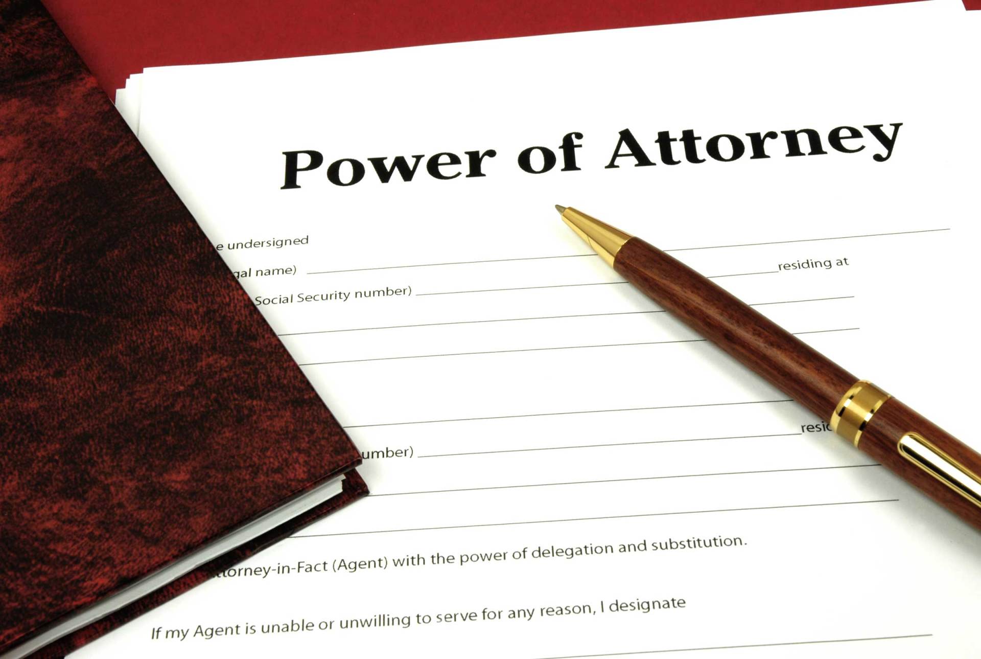 Power of Attorney Document with Pen and Legal Book — Huntsville, AL — Elissa Green Attorney at Law