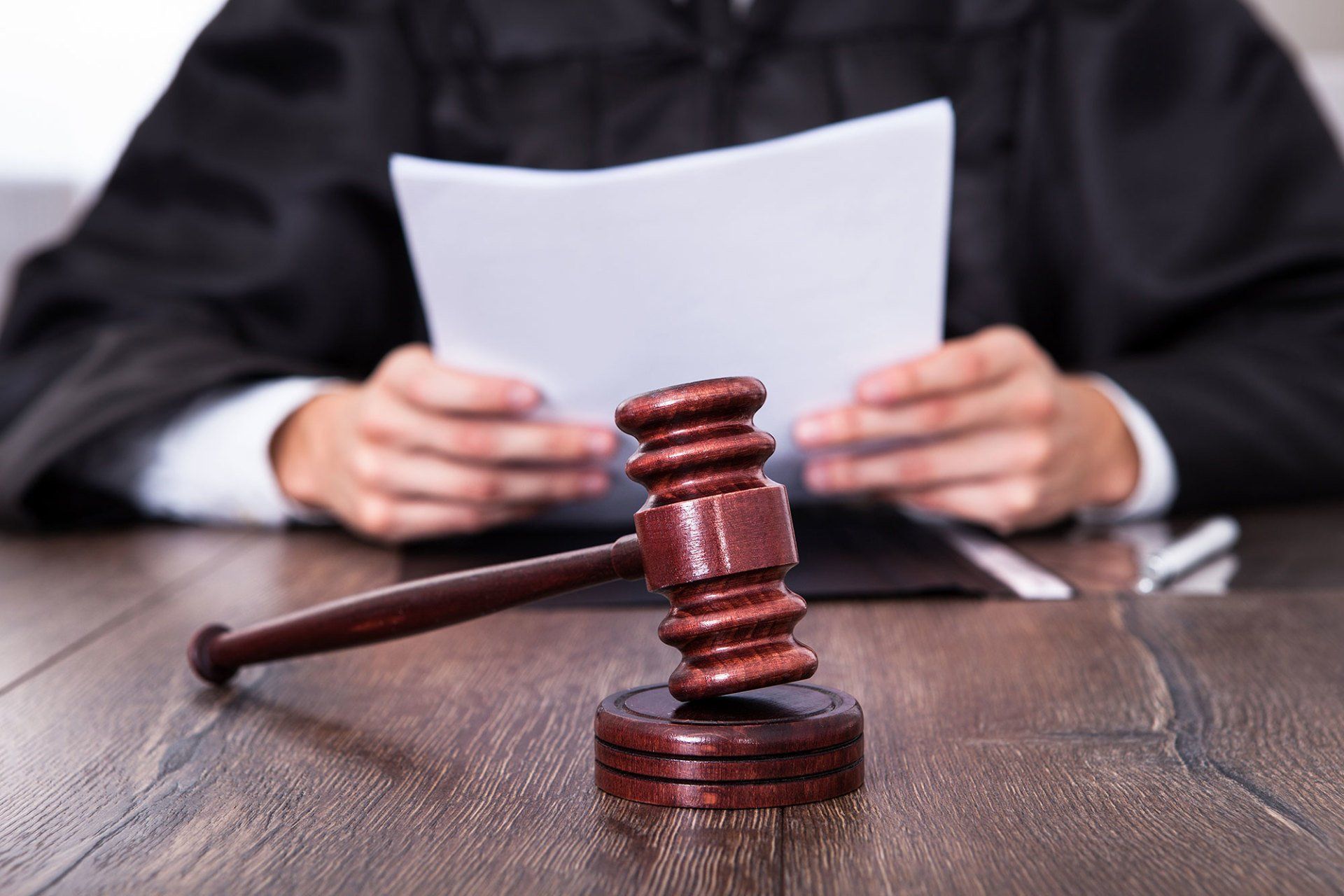 Judge In Front Of Mallet Holding Documents — Huntsville, AL — Elissa Green Attorney at Law