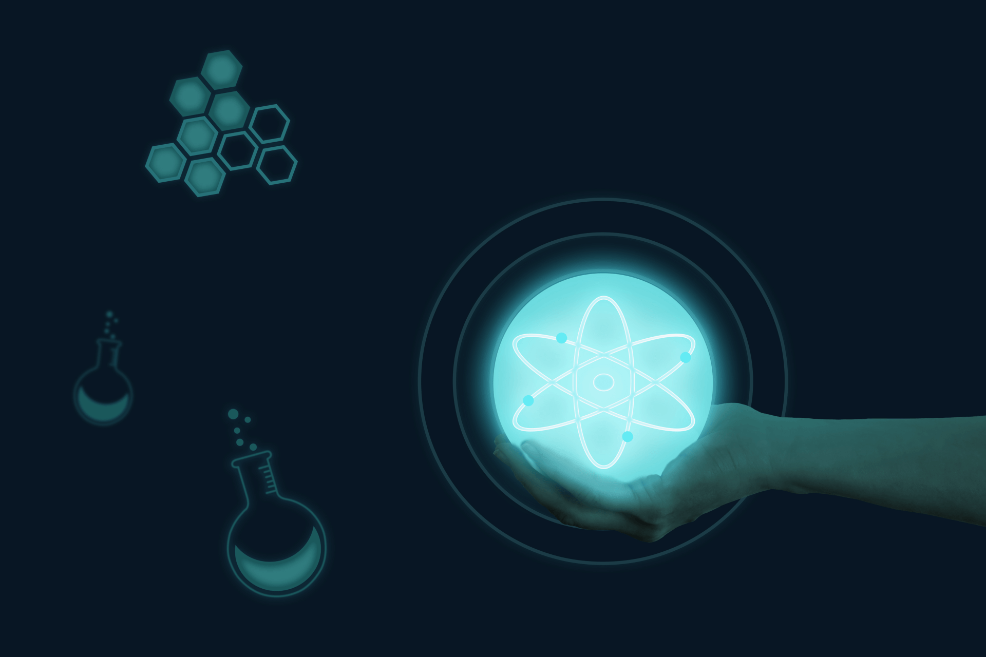 woman's hand holding an atom