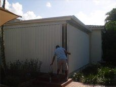 Accordion_shutter_covering_the_whole_patio.JPG Accordion_shutter_covering_the_whole_patio.JPG