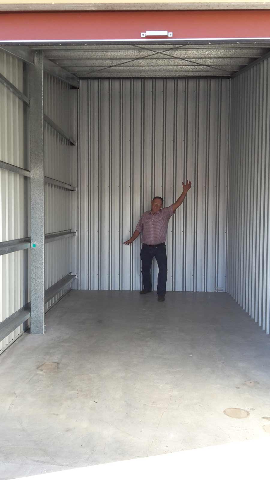 johnson road self storage gracemere man standing in the storage unit