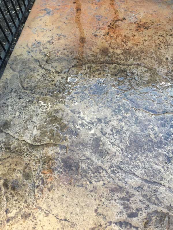 wet discoloured concrete