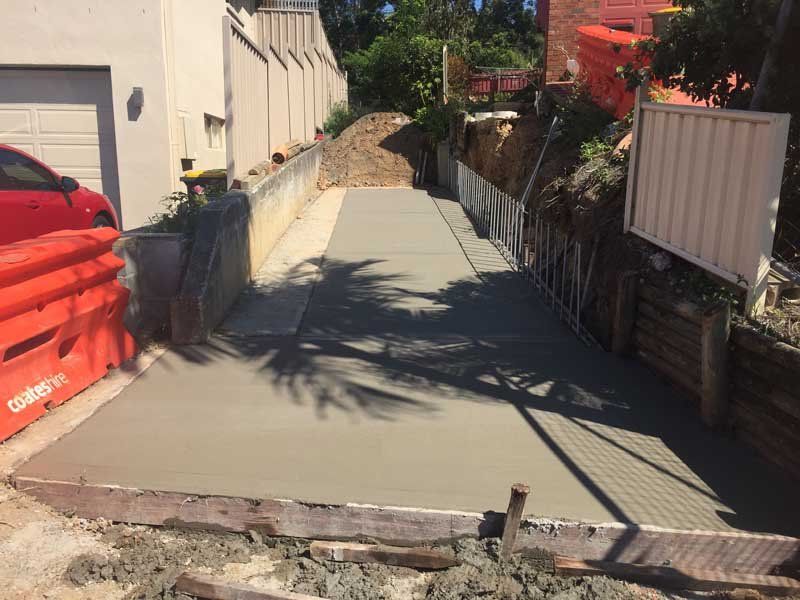fresh concrete in backyard
