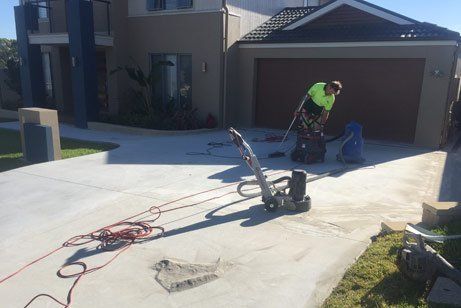T & T Coastal Concreting working cleaning concrete t and t coastal concreting working cleaning concrete