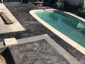 Pool area with new concrete pool area with new concrete