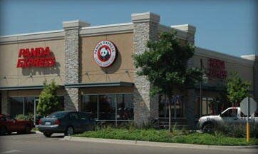 Panda Express restaurant exterior with cars parked out front.