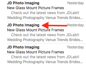 Red arrow pointing to a “JD Photo Imaging” email listing with “New Glass Mount Picture Frames” subject line