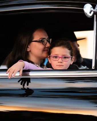 family in car