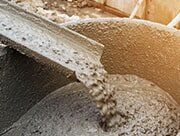 Pouring cement during for construction — Agricultural equipment in Wapato, WA Pouring cement during for construction — Agricultural equipment in Wapato, WA