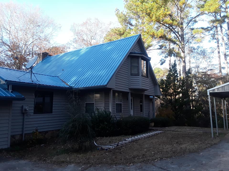 Residential House with Blue Metal Roof — LaGrange, GA — Ricky Smith Roofing Inc