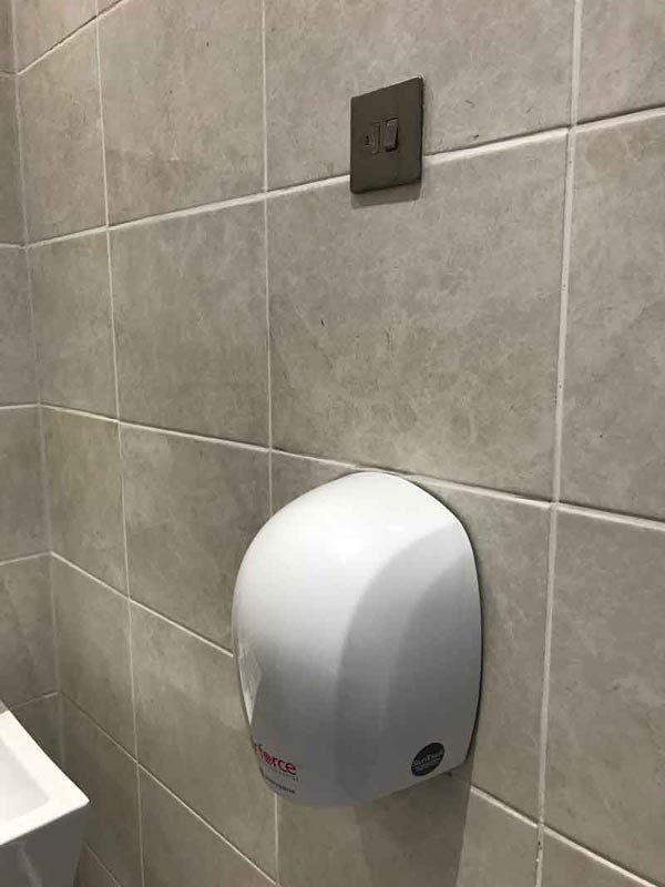 Electrician hand dryer installation
