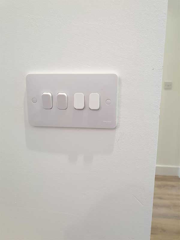 4 Gang switch in white installed by professional electrician in Leicester