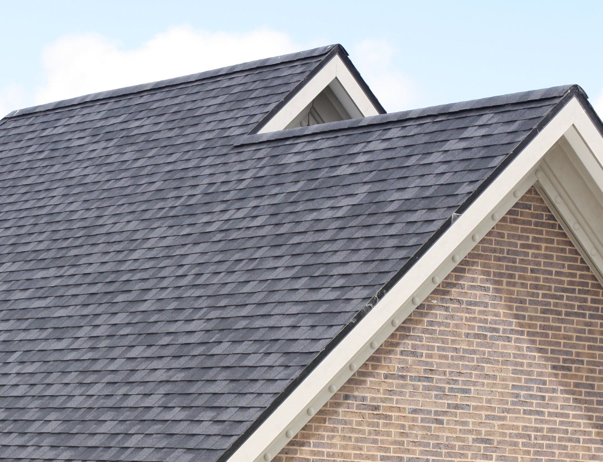 home just after new shingle roof installation