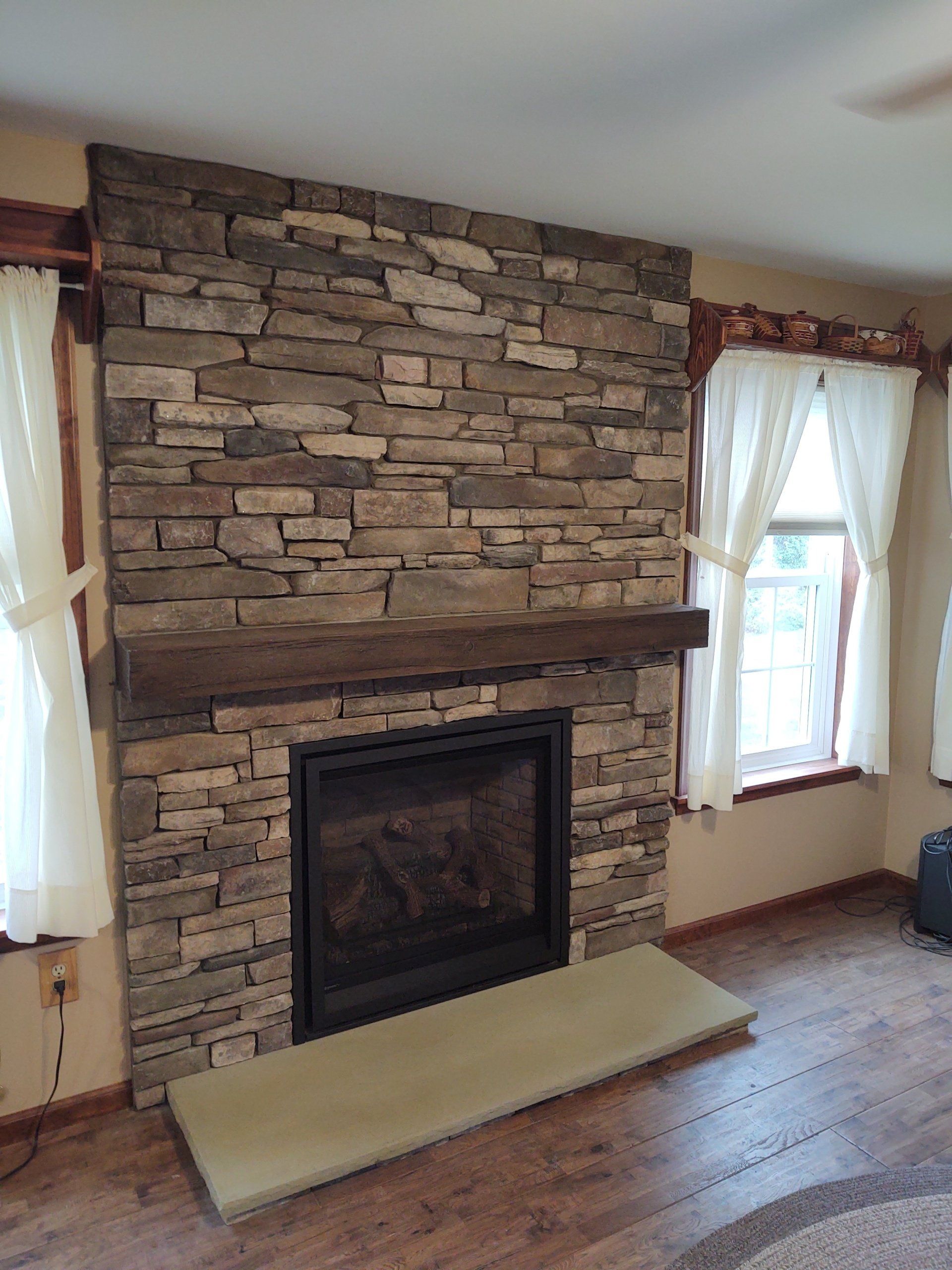 chardonny susquhanna ledgestone fireplace with buff hearth
