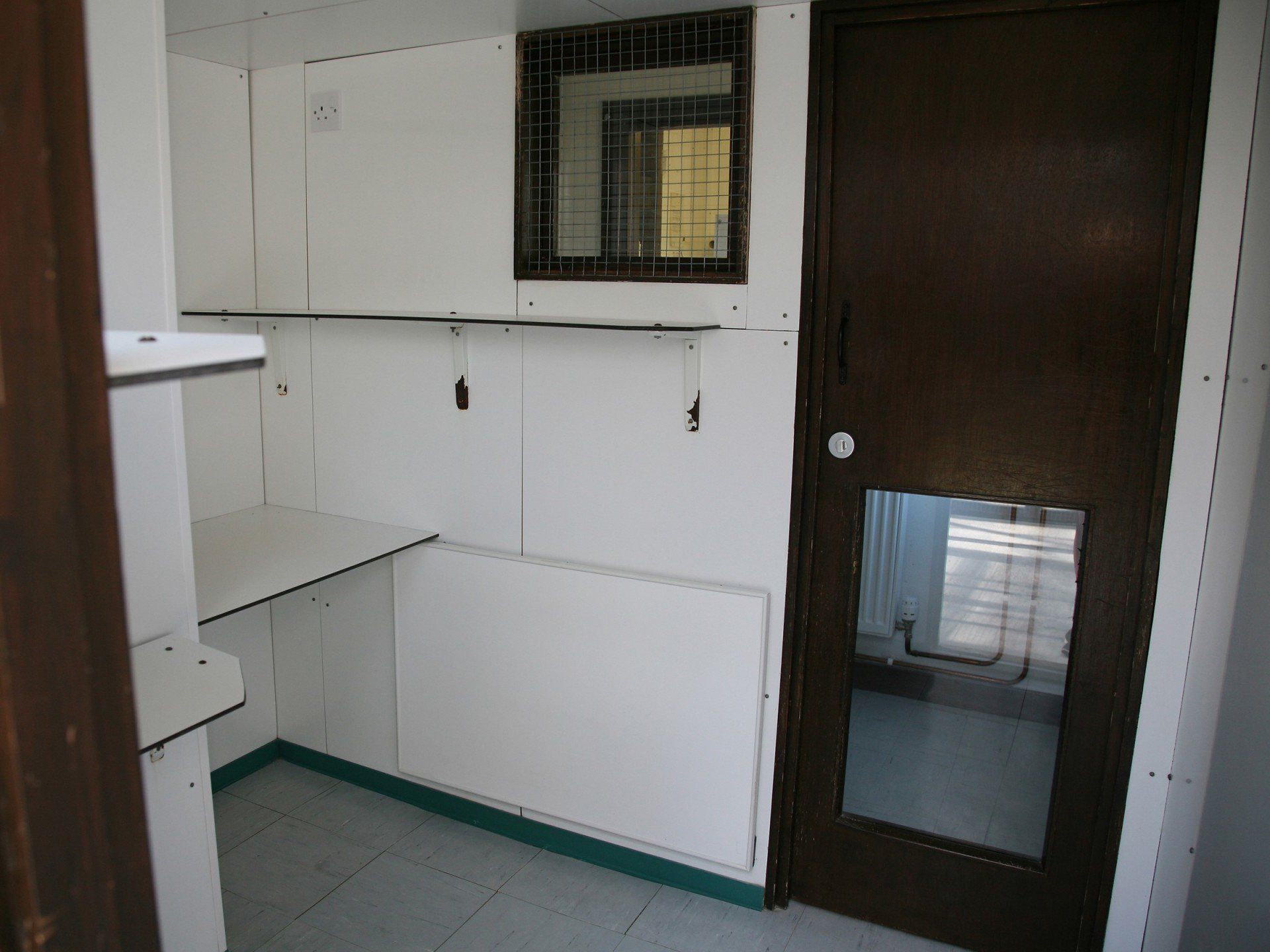 room with cupboards and storage area