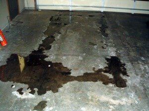 Oil Stained Garage Floor — Able Concrete in Minneapolis, MN
