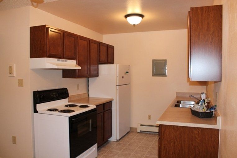 Interior shot of kitchen space at the Western Village Apartments