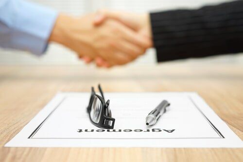 Shaking Hands Over Agreement — Accounts Receivable Management in Buddina, QLD