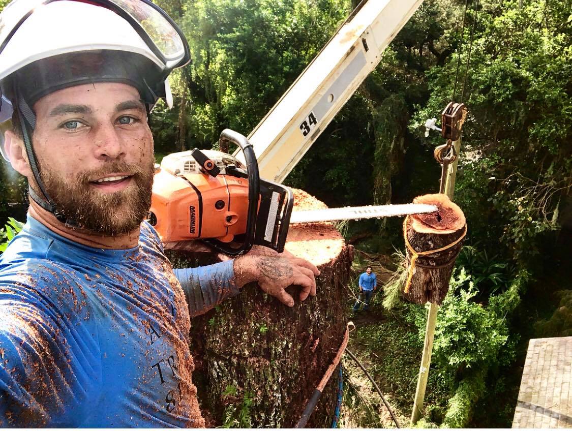 A Man Taking A Selfie Above The Tree — Tampa, FL — A Baker's Tree Service