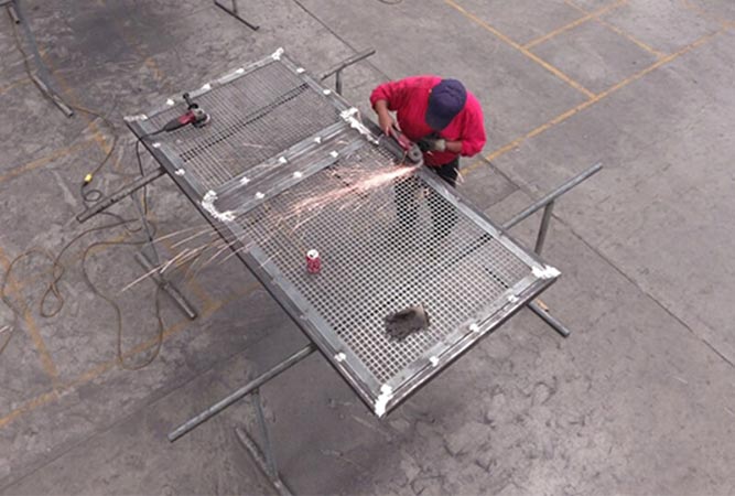 One of our men creating metal fence - Fences in Glendale, AZ