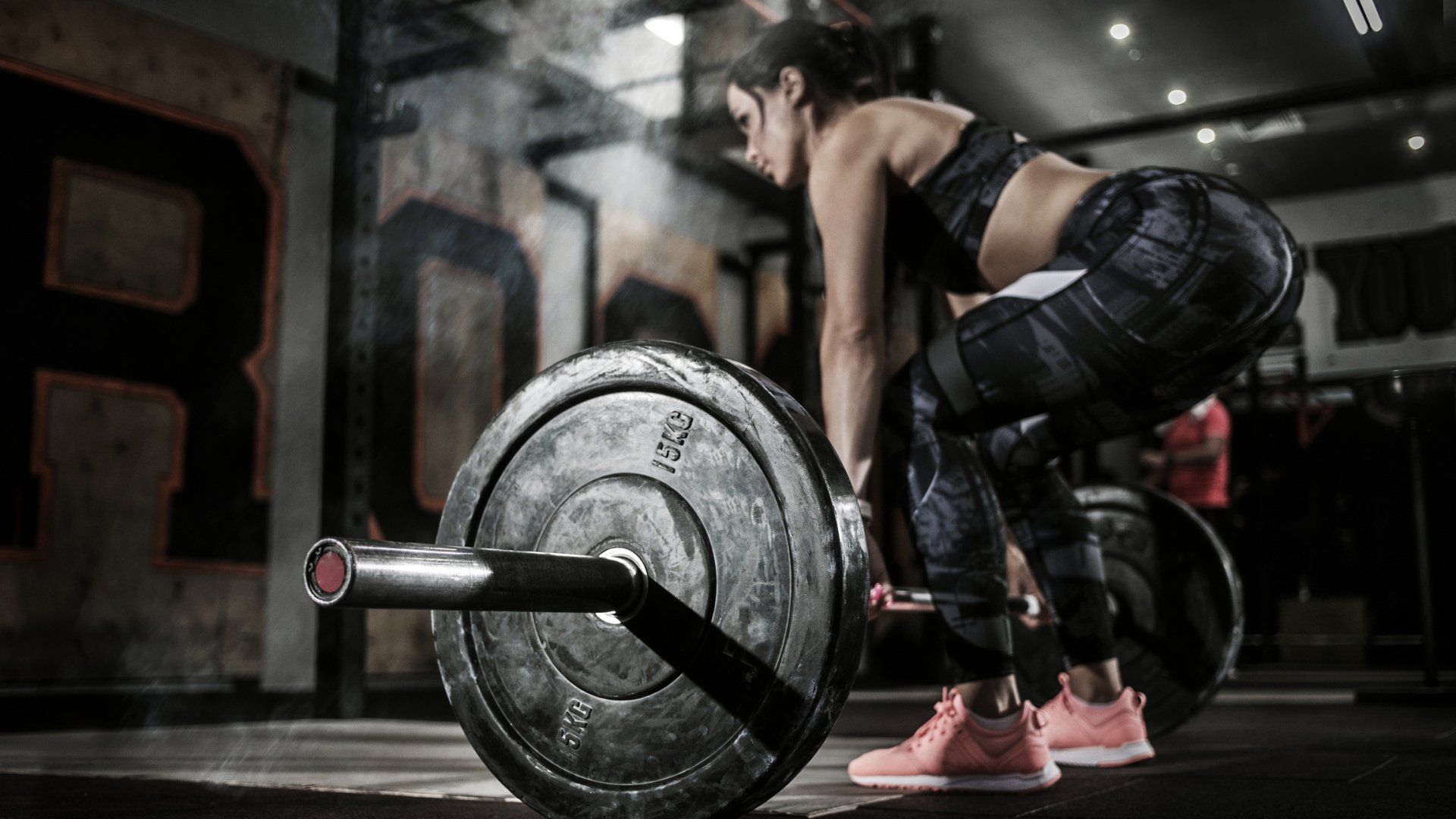 Woman Doing Weight Training — Longmont, CO — Longmont Athletic Club