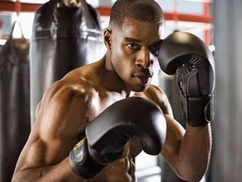 Man Wearing Boxing Gloves — Longmont, CO — Longmont Athletic Club
