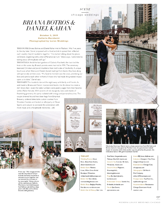 A bride and groom are kissing on a balcony at their wedding.