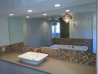 Shower Door Installation — Bathroom with Two Round White Vessel Sinks and Wide Mirror in Olathe, KS