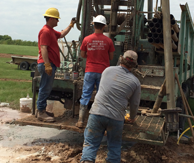 Man Working — Decatur, TX — Bisidas Water Well Drilling B&B Pump Man Working — Decatur, TX — Bisidas Water Well Drilling B&B Pump