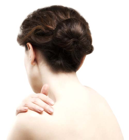 Rear view of beautiful young woman, studio shot