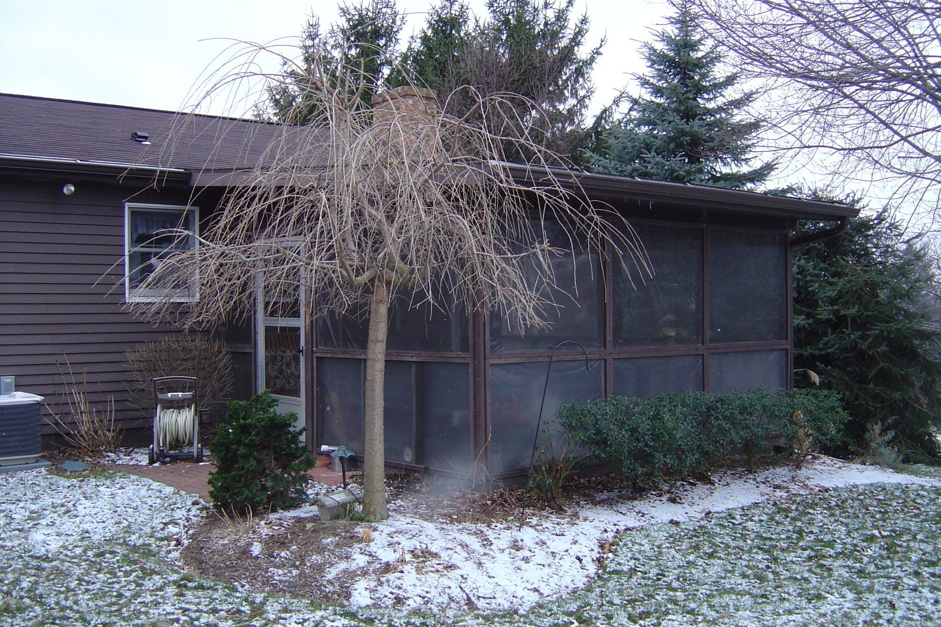 slider show a before picture and after picture of a porch enclosure built by Betterliving Patio Rooms of Pittsburgh