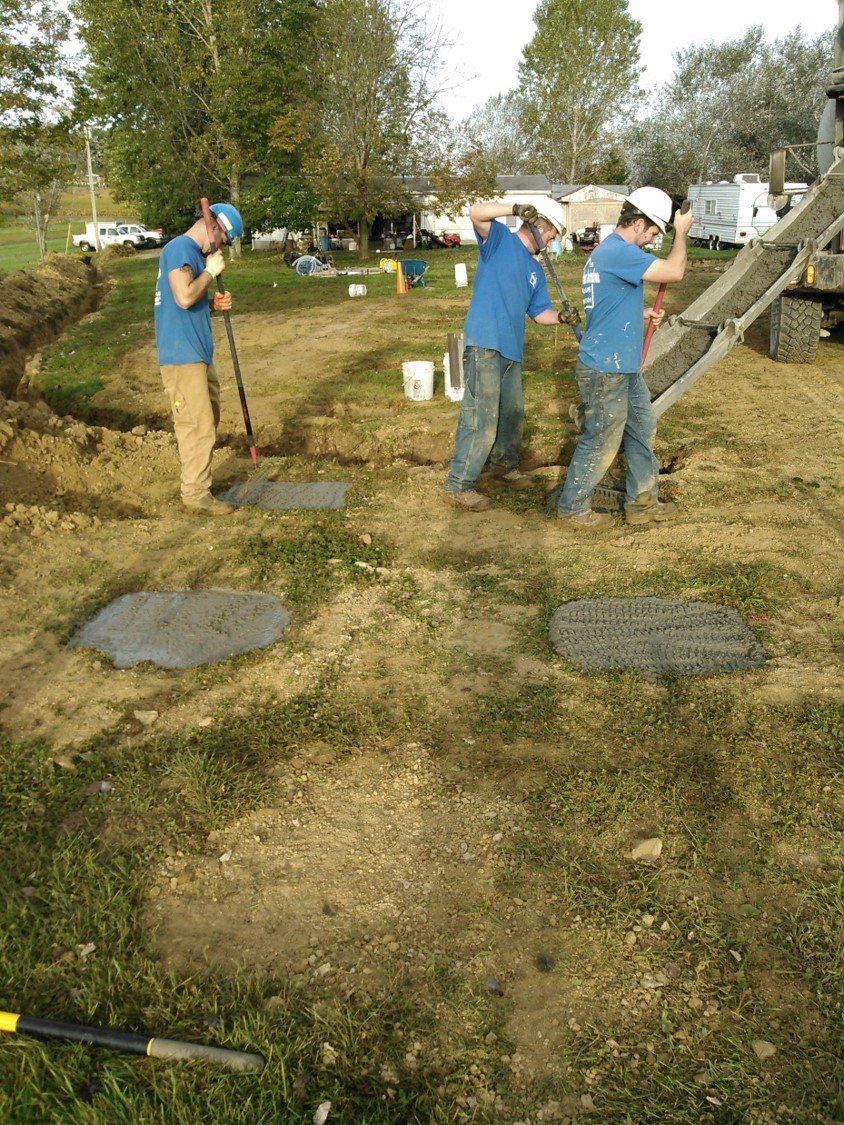 Lawn Service — Workers Putting Cement in Slippery Rock, PA