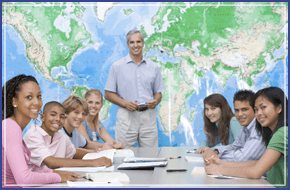 If you would like to improve your English in Manchester call 0161 441 6667 A man stood in front of a map with seven young people sat at a large desk
