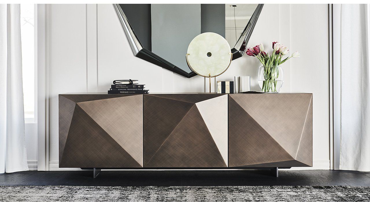 Cattelan Italia Kayak Sideboard with 2 or 3 doors, in 8 optional finishes with Stainless Steel legs, in painted White or Matt Graphite. Interior shelves in transparent Crystal, with optional inner drawers in a contemporary living dining space.