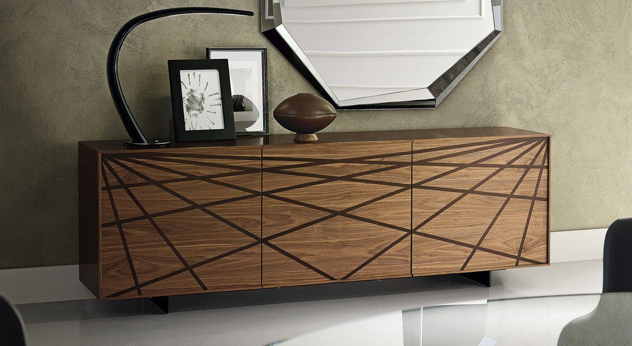 Cattelan Italia Webber Sideboard  in Canaletto Walnut or Smoked Oak with Black painted Steel Legs in a dining space.