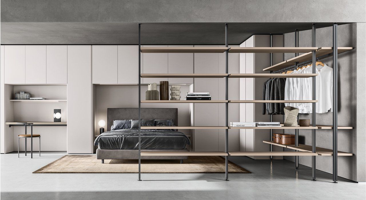 Bedroom with Room Divider shelving. Available as shown in wood, smoke glass and a large selection of lacquers.