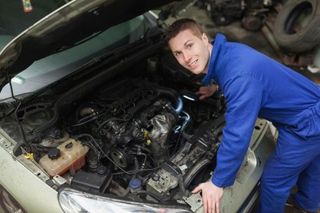 Mechanician changing car wheel - repair in Worcester, MA Mechanician changing car wheel - repair in Worcester, MA