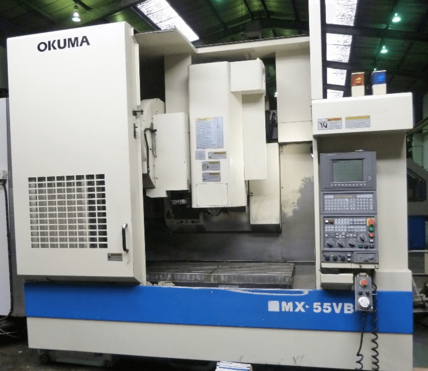 A machine that has the word okuma on it