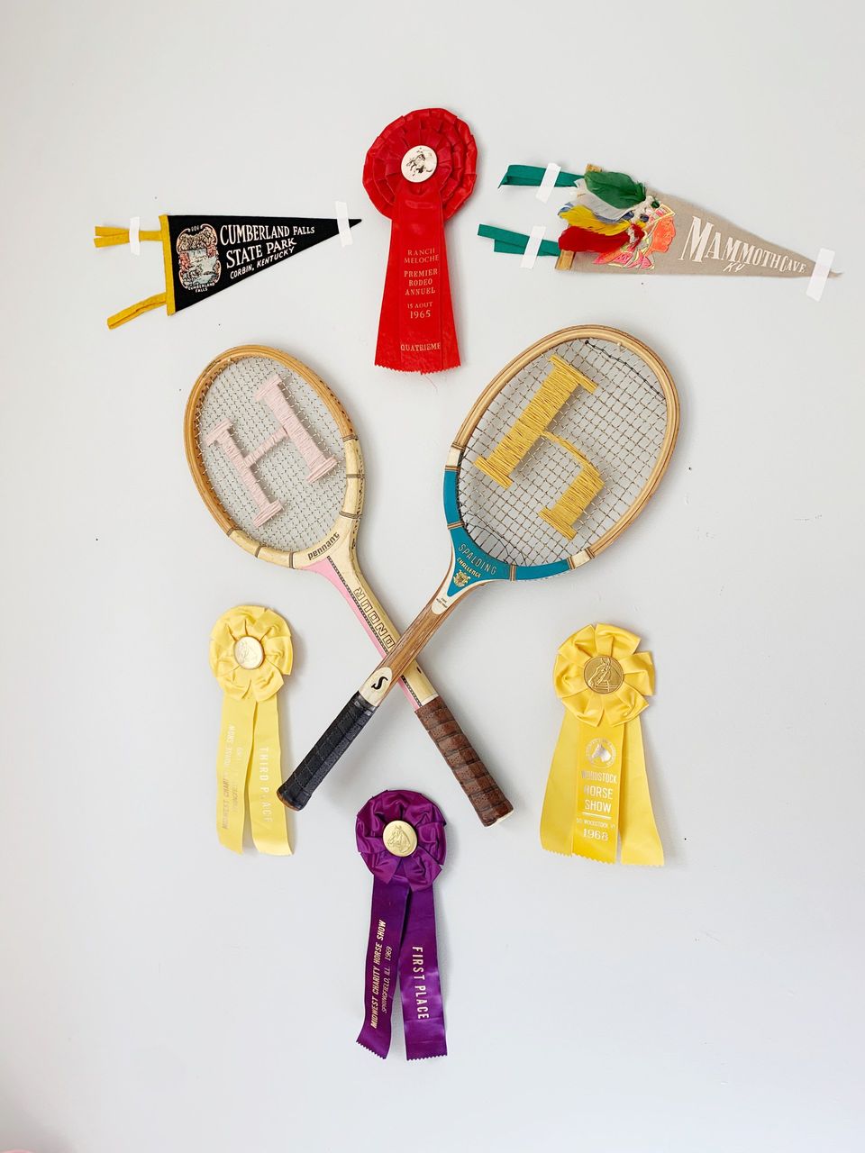 Crossed wood rackets wall decor little girls room