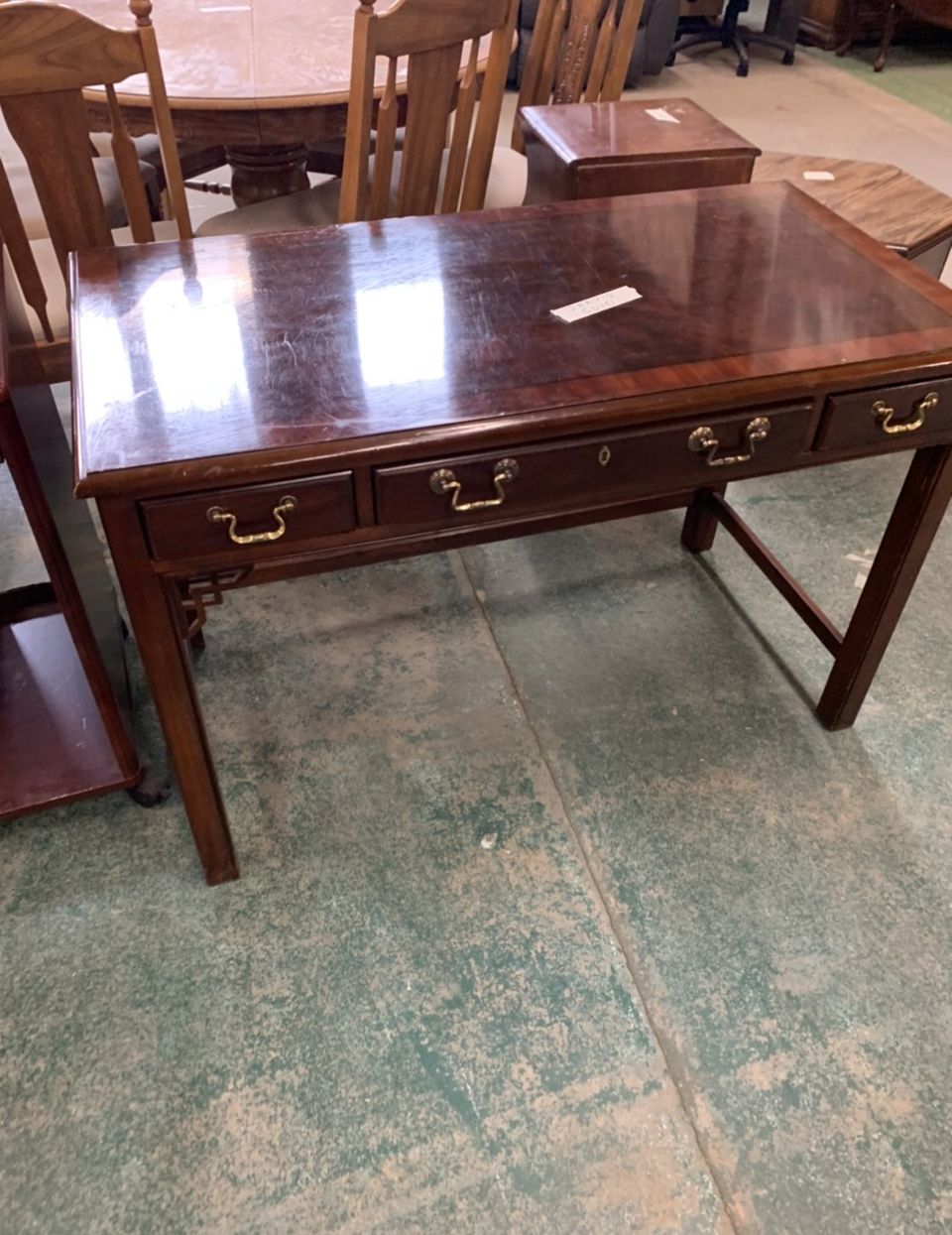 Wood desk at thrift store yardsale