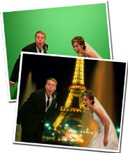 A bride and groom are posing for a picture in front of the eiffel tower.