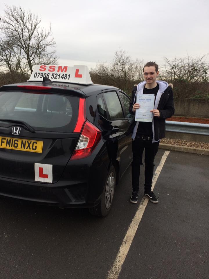 A man passing the driving test