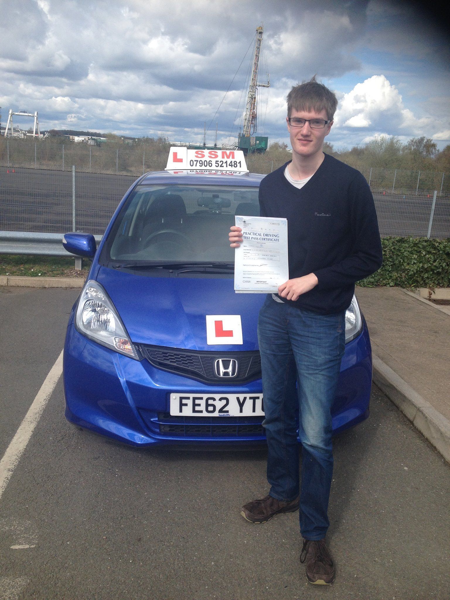 A man passing the driving test