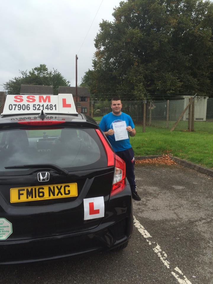 A man passing the driving test