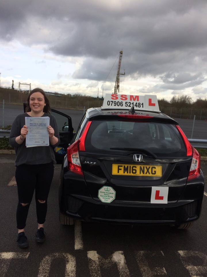 A woman passing the driving test