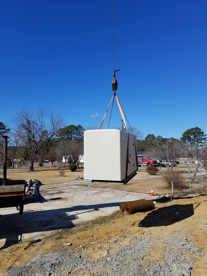 Generator Being Lifted — Lumberton, NC — Rogers Electric, Inc