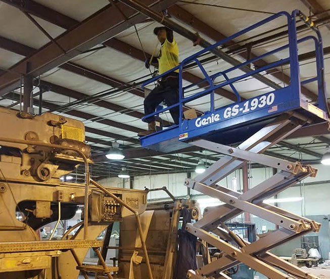 Staff Fixing Electrical Issue — Lumberton, NC — Rogers Electric, Inc Staff Fixing Electrical Issue — Lumberton, NC — Rogers Electric, Inc